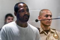 Kevin Hoskins stands for his initial court appearance before Judge Holly Stoberski at the Regio ...