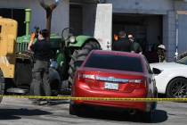 Las Vegas Metropolitan Police investigators inspect the scene of a fatal stabbing on the 1400 b ...