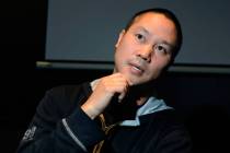 Zappos CEO Tony Hsieh gestures during an interview before the srtart of the LaunchUp Las Vegas ...