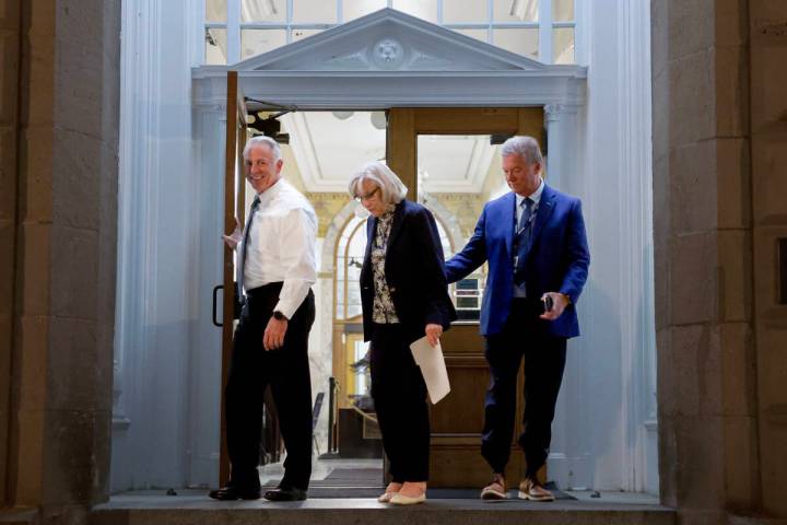 Gov. Joe Lombardo, left, and Sen. Roberta Lange, D-Las Vegas, emerge from the Capitol building ...
