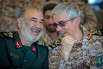 Brig. Gen. Mohammad Bagheri, the deputy chief of staff of Iran's armed forces, right, and Brig. ...