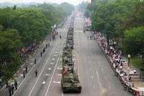A military parade commemorating the Army's 250th anniversary and coinciding with President Dona ...