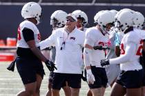 UNLV football head coach Dan Mullen instructs his players during football spring practice at th ...