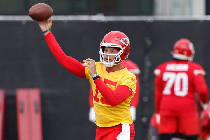 Kansas City Chiefs quarterback Patrick Mahomes throws a pass during the NFL football team's org ...