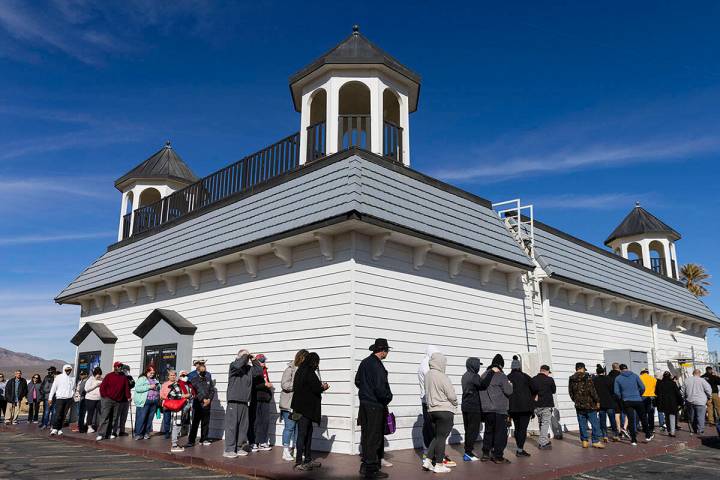 People wait in line to buy lottery tickets at The Lotto Store at Primm, just inside the Califor ...