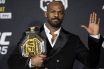 UFC heavyweight champion Jon Jones poses with his title belt at the UFC 285 post-fight news con ...